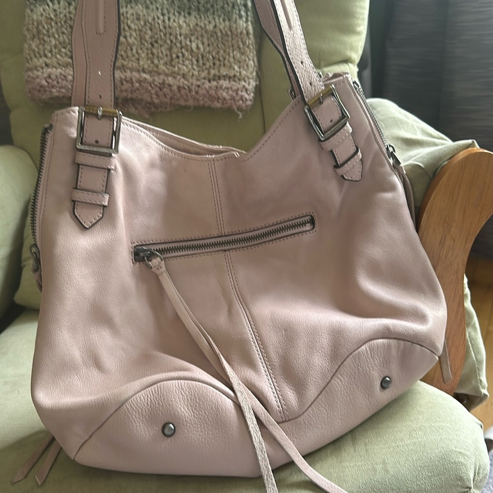 Excellent condition bag, clean, fits a lot! Only carried it a few times.